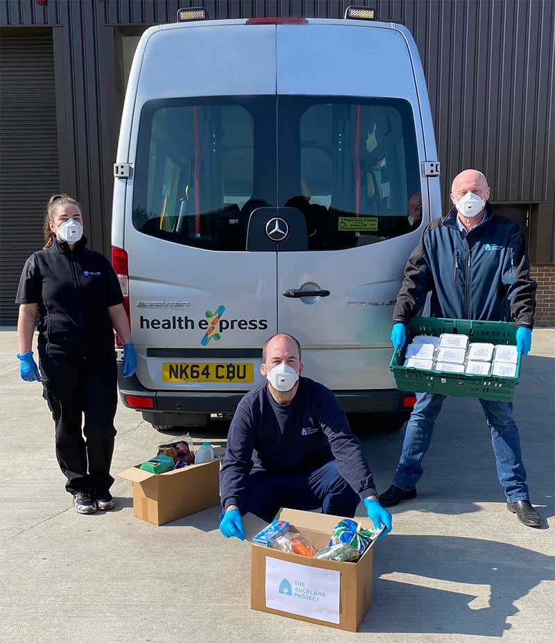 Carly Yorke, Health Express Volunteer, with Lee Brownson and Robert Wicks of The Auckland Project.